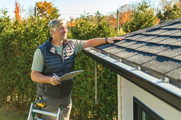 Professional Roofing technician working in Ada, OK
